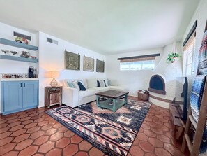 Smart TV, fireplace, books