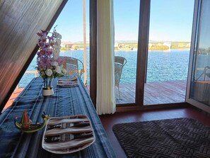 Deluxe Suite, Lake View | In-room dining