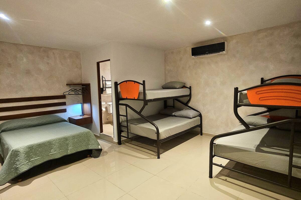 Family Quadruple Room | Down comforters, minibar, individually decorated, iron/ironing board