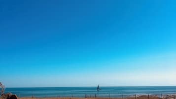 On the beach, beach towels