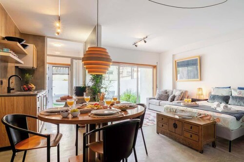 HostWise – Modern Flat w/ Terrace | Near the Beach