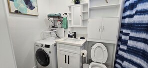 Hair dryer, towels, soap, toilet paper