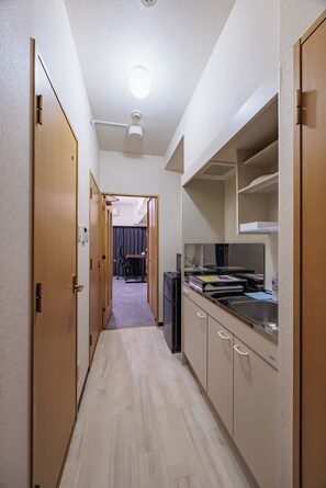Basic Double Room, Balcony, City View | Private kitchen - OPT Gendai House Kogane (Nagoya)
