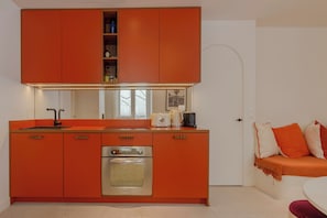 Apartamento conforto, vista para o pátio | Cozinha privada