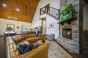 Smart TV, fireplace, table football, books