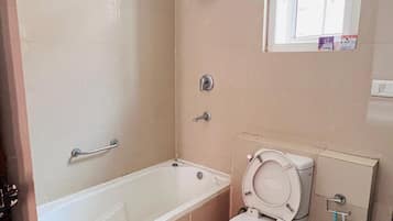 Shower, towels, soap, toilet paper