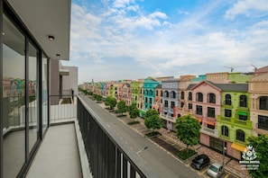 Deluxe Quadruple Room, Multiple Beds, City View | Hypo-allergenic bedding, minibar, in-room safe, desk