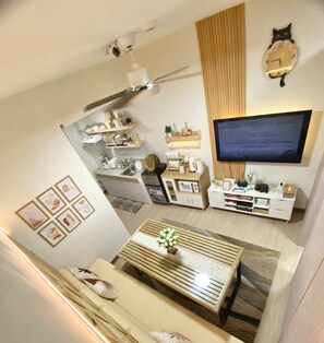 Condo, 1 Bedroom | Living room - Aesthetic Cozy Stay With Ps4, Netflix & Coffee Nook - Elena Suites Staycation (Caloocan)