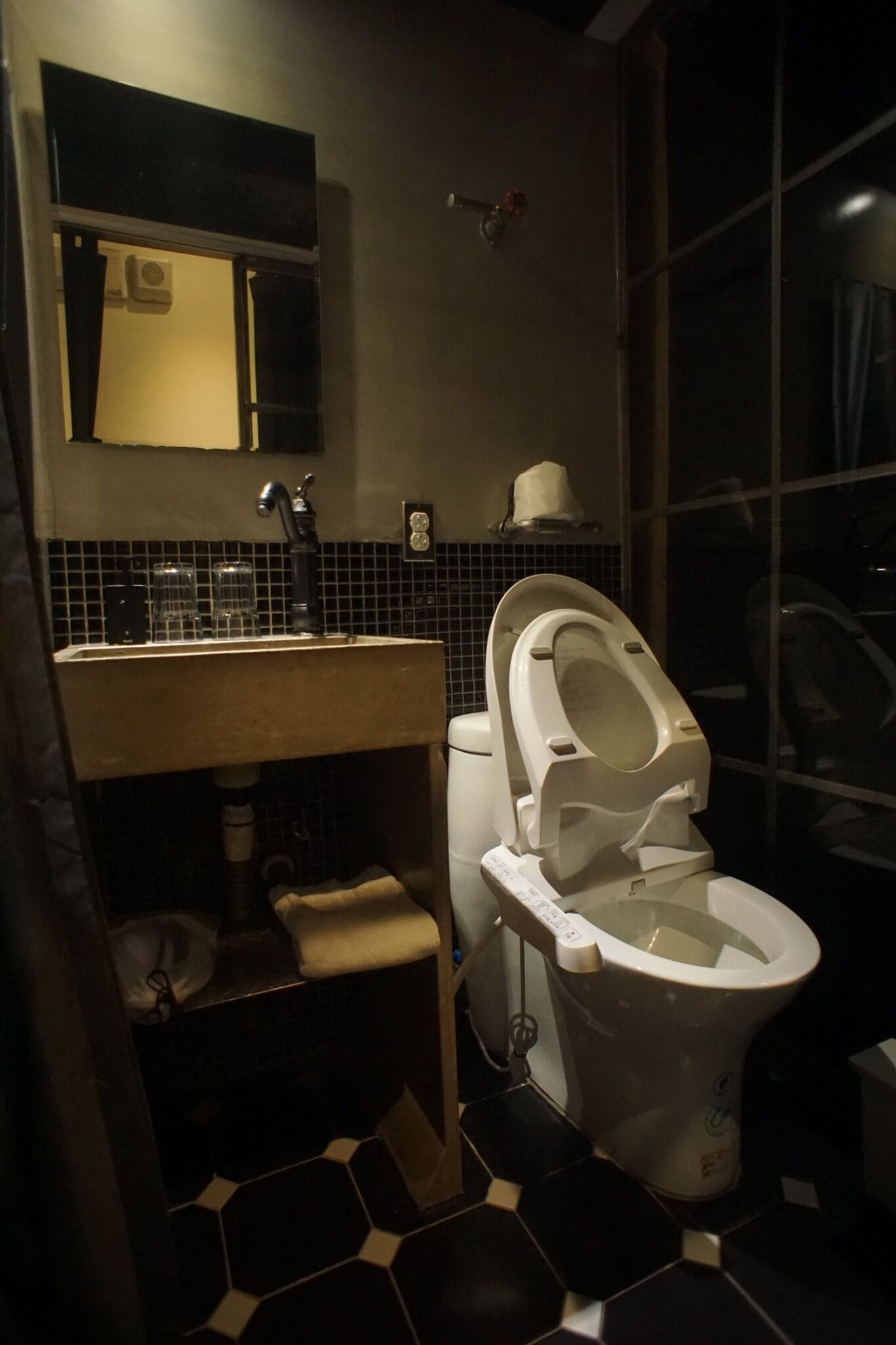 Shower, hair dryer, towels, shampoo