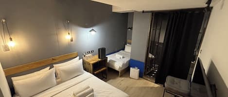 Basic Triple Room, Non Smoking | Desk, laptop workspace, free WiFi