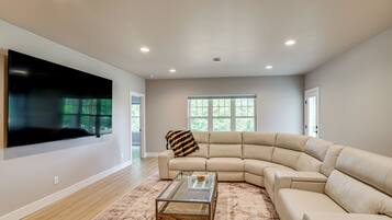 TV, fireplace, books