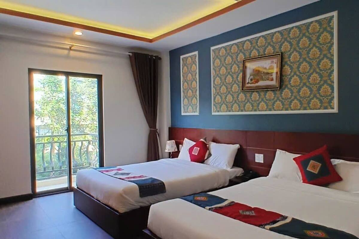 Phòng đôi hoặc 2 giường đơn dành cho gia đình, 2 giường cỡ queen, quang cảnh thành phố | Bàn, truy cập Internet không dây miễn phí
