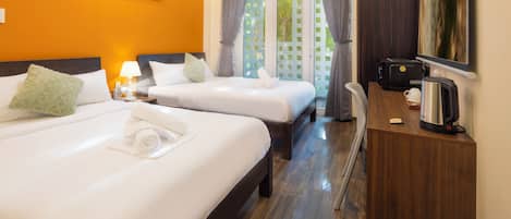 Family Quadruple Room | Desk, blackout drapes, iron/ironing board, free WiFi