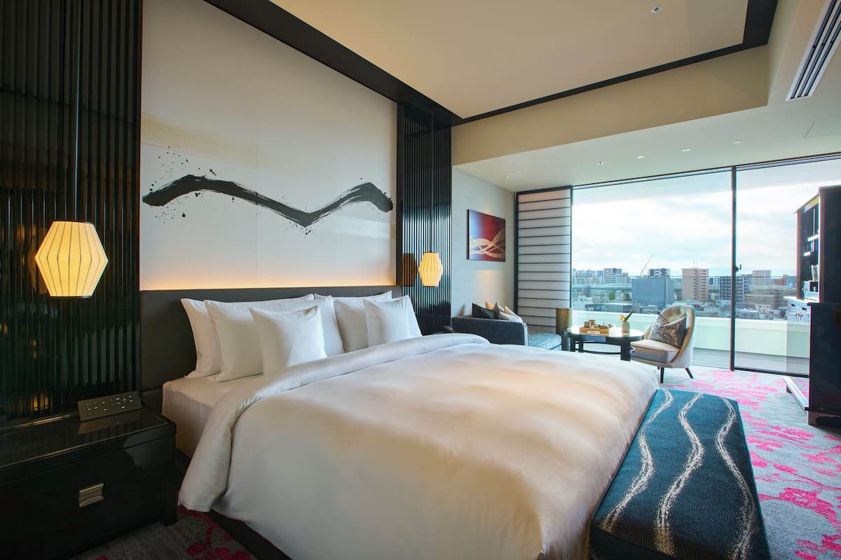 Deluxe City View King, Non Smoking | Premium bedding, down comforters, minibar, in-room safe