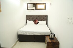 Economy Room | Premium bedding, down duvets, memory-foam beds, individually decorated