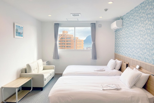 Quarto duplo luxo | Escrivaninha, Wi-Fi de cortesia, roupa de cama