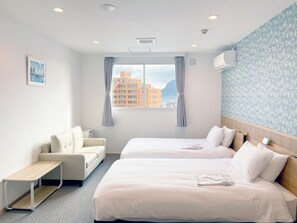 ห้องดีลักซ์ทวิน | โต๊ะทำงาน, Wi-Fi ฟรี, ผ้าปูที่นอน