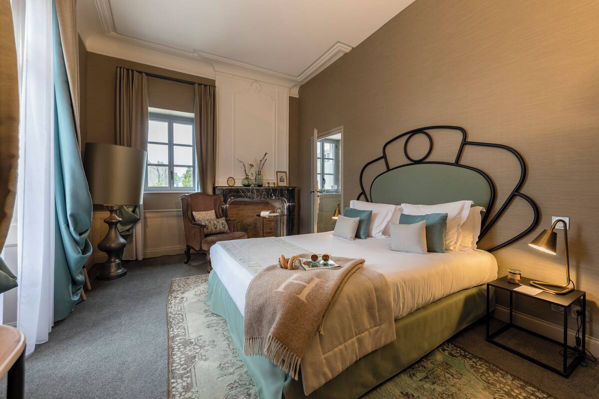 Deluxe Double Room, Courtyard View | In-room safe, desk, laptop workspace, soundproofing