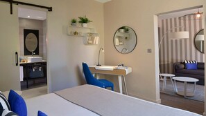Suite, Garden View | In-room safe, desk, laptop workspace, soundproofing