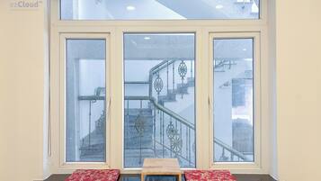 Deluxe Double Room, Patio, Courtyard View | Desk, soundproofing, iron/ironing board, bed sheets