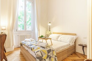 1 habitación, tabla de planchar con plancha, wifi gratis y ropa de cama 