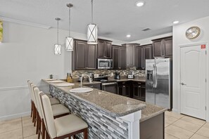 Microwave, stovetop, dishwasher, coffee/tea maker