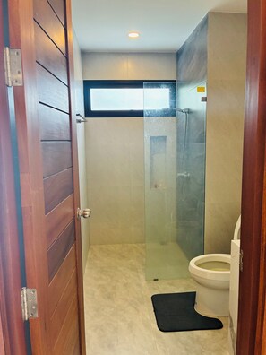 Shower, hair dryer, towels, soap