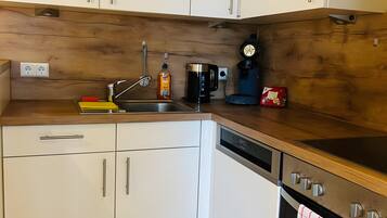 Réfrigérateur, four, plaque de cuisson, lave-vaisselle