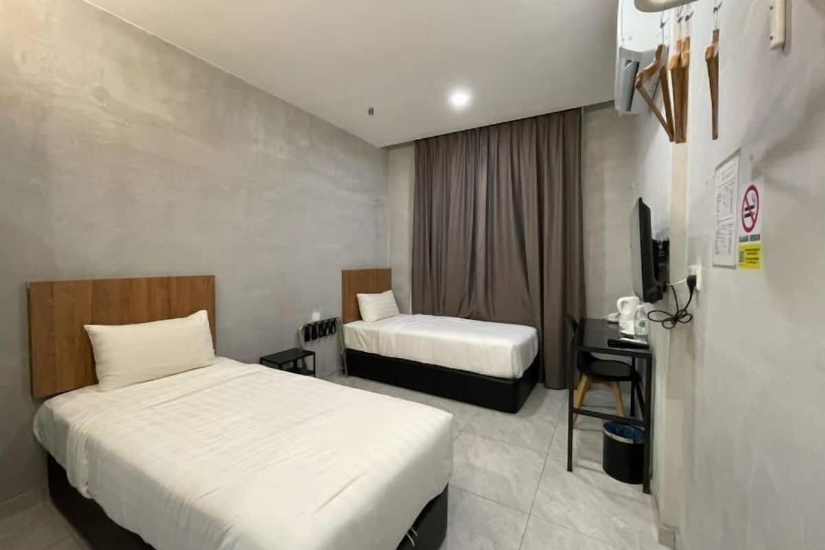 Desk, laptop workspace, WiFi (free), bed sheets