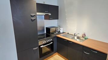 LÀgenhet - flera sÀngar - utsikt mot staden | Eget kök