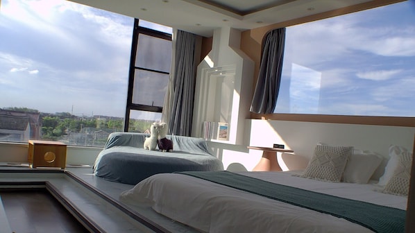 Down duvets, laptop workspace, blackout curtains, iron/ironing board