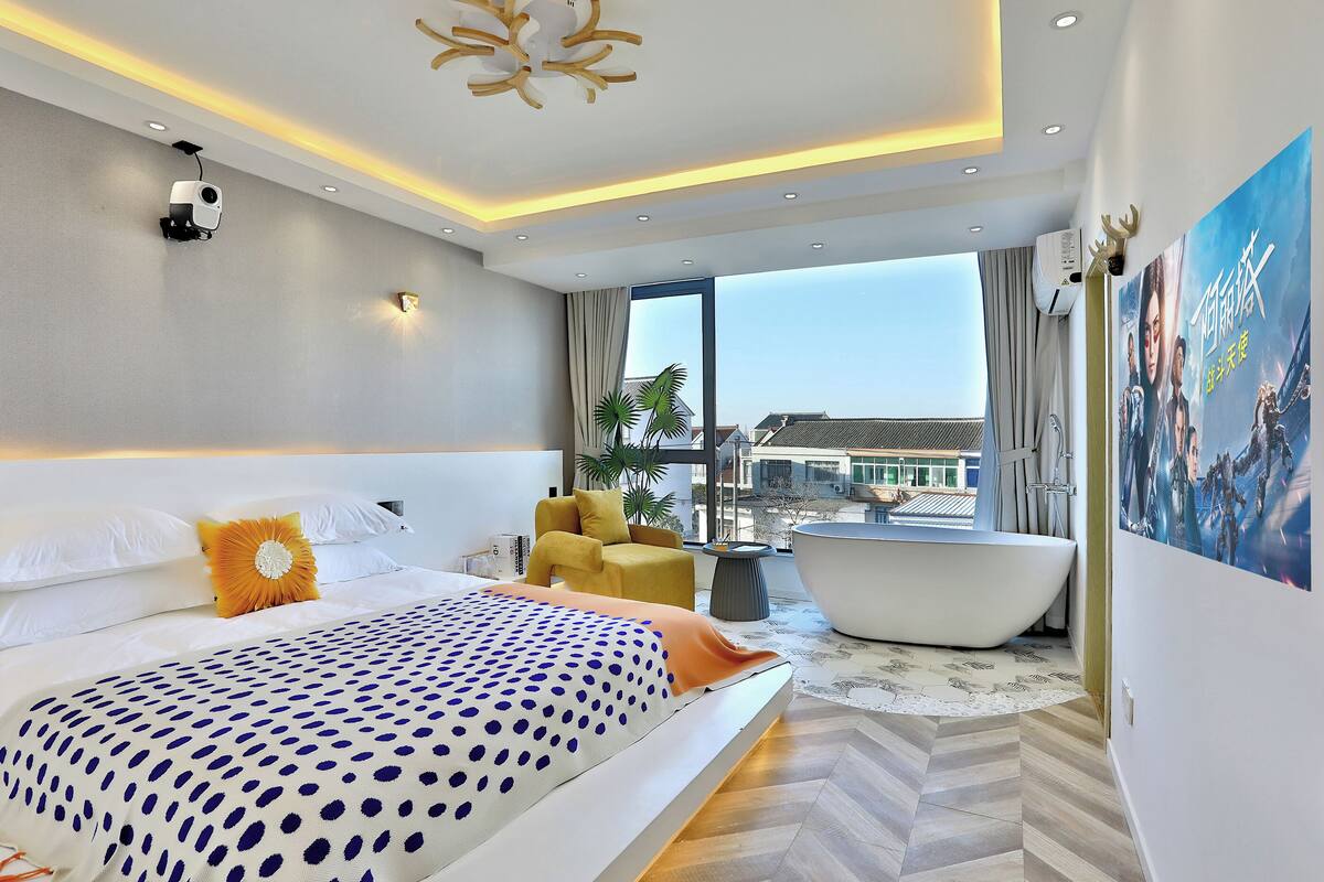 Honeymoon Double Room | Down comforters, laptop workspace, blackout drapes, iron/ironing board