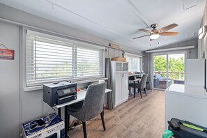 Interior - Spacious 3BR, 2BA beach home just a short walk from the sand! Three bedrooms up, private queen room and bath down. Secure 2-car garage for vehicles or a small boat. Perfect for families or groups. 30-day minimum stay required. (New Smyrna Beach)