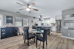 Dining - Spacious 3BR, 2BA beach home just a short walk from the sand! Three bedrooms up, private queen room and bath down. Secure 2-car garage for vehicles or a small boat. Perfect for families or groups. 30-day minimum stay required. (New Smyrna Beach)