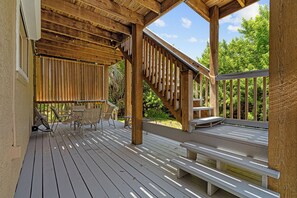 Terrace/patio - Spacious 3BR, 2BA beach home just a short walk from the sand! Three bedrooms up, private queen room and bath down. Secure 2-car garage for vehicles or a small boat. Perfect for families or groups. 30-day minimum stay required. (New Smyrna Beach)