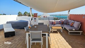 Outdoor dining - 2-bedroom house with a view of the Guadiana River & Hot tub VAN01 (Ayamonte)
