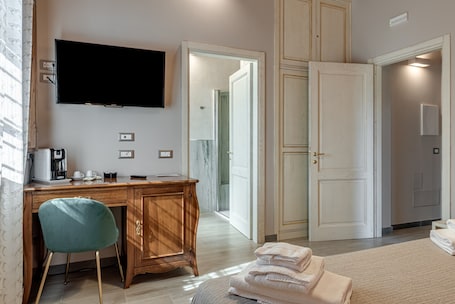 1 chambre, Wi-Fi, draps fournis. Chambre 'Il Borghetto Orchidea' avec jardin partagé, Wi-Fi et climatisation