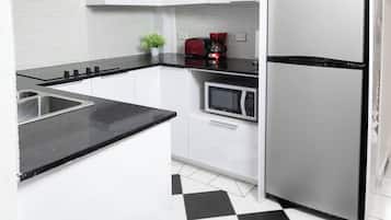 Fridge, microwave, stovetop, coffee/tea maker