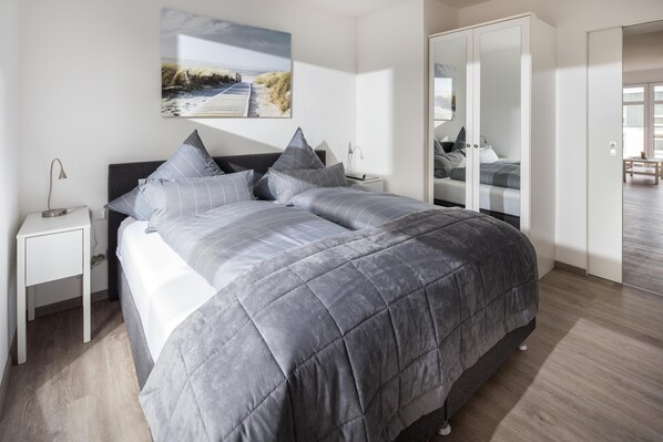 Iron/ironing board, travel crib, free WiFi, bed sheets