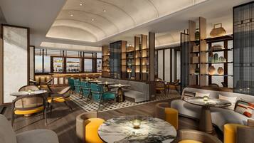 A modern interior with seating areas, a bar, and shelves with decorative items.