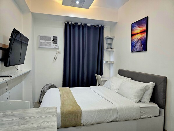 Desk, blackout curtains, iron/ironing board, free WiFi