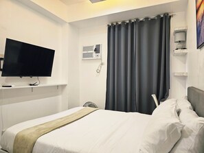 Desk, blackout curtains, iron/ironing board, free WiFi