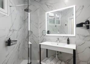 Studio with Sofa Bed | Bathroom | Separate tub and shower, eco-friendly toiletries, hair dryer, towels