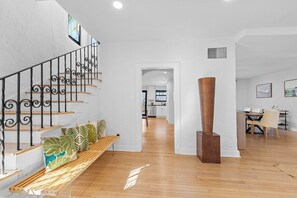 Interior - Discover your perfect getaway in this spacious and vibrant 4BR home featuring a sparkling private pool and a separate guest cottage. Perfect for families & groups seeking comfort, privacy, and easy access to all that West Palm Beach has to offer! (West Palm Beach)