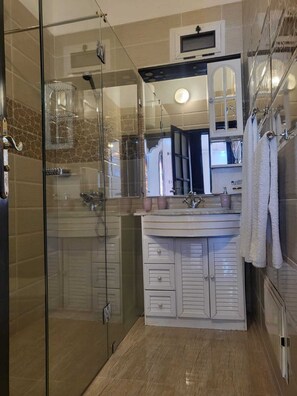 Hair dryer, towels, soap, toilet paper