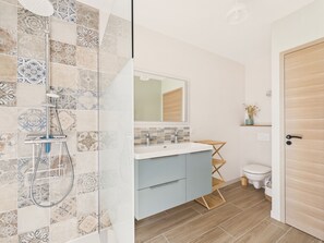 Regadera y secadora de cabello 