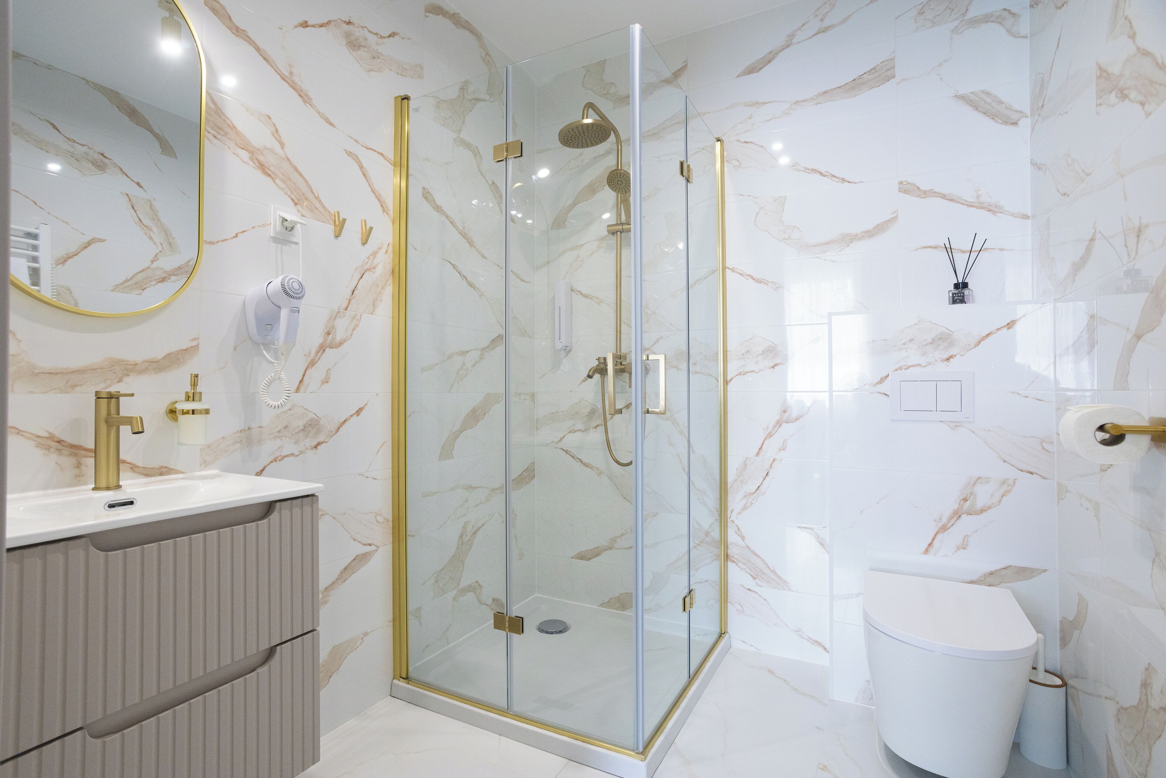 Shower, hair dryer, towels, soap