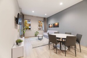 Apartment, 2 Bedrooms, Balcony | Living area | 32-inch flat-screen TV with digital channels - JOIVY Treviso Vittoria (Treviso)