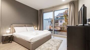 Apartamento, 2 quartos, sacada | Ferros/tábuas de passar roupa, Wi-Fi de cortesia, roupa de cama