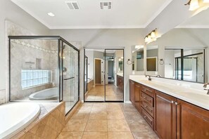 Shower, hair dryer, towels, shampoo